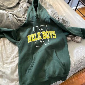 A Nelk Boy’s collegiate hoodie.
